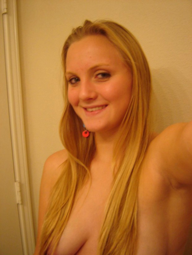 Blonde college teen shows her boobies