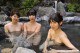 Lovely Asian brunettes taking a bath in the river