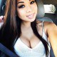 Hot and busty Asian babe drives her car