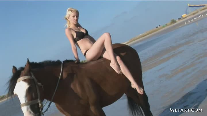 Topless horse riding